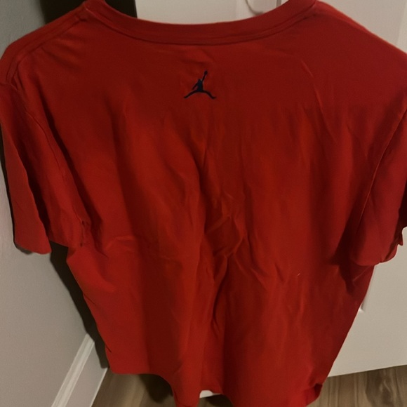Red shirt with blue jump man letters - Picture 4 of 4